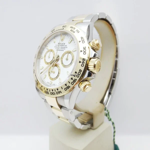21903233 t2ej8gc4mhczbavy04vp2eut ExtraLarge 600x602 - Rolex Daytona ref. 116503 White dial like new 2019 full set unpolished